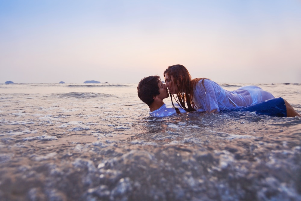 Kissing on the beach